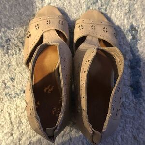 48. Open toed booties